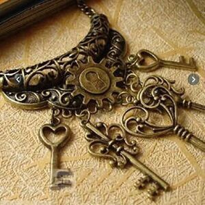 Bronze vintage Key dangle necklace .